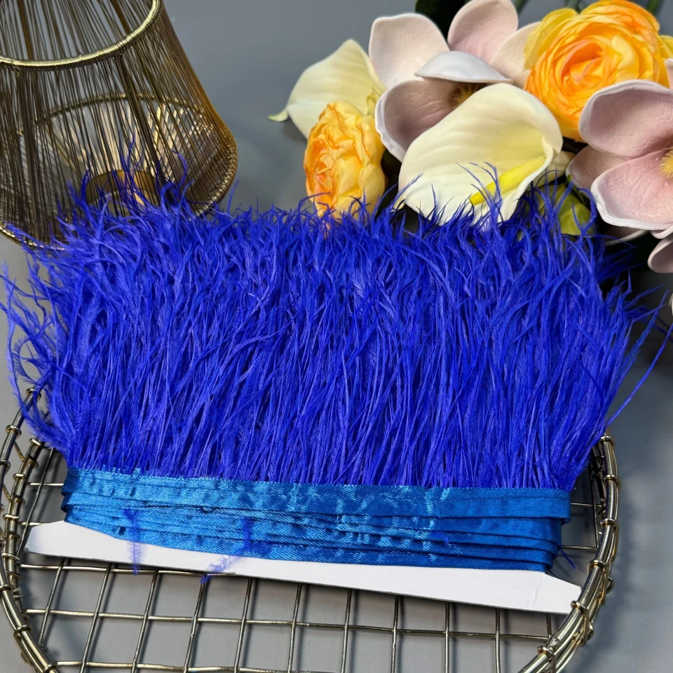 Натуральне пір'я на тасьмі  7-10 см (1 метр), 34 електрик